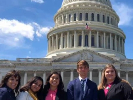 teenagers in front of united states captial building