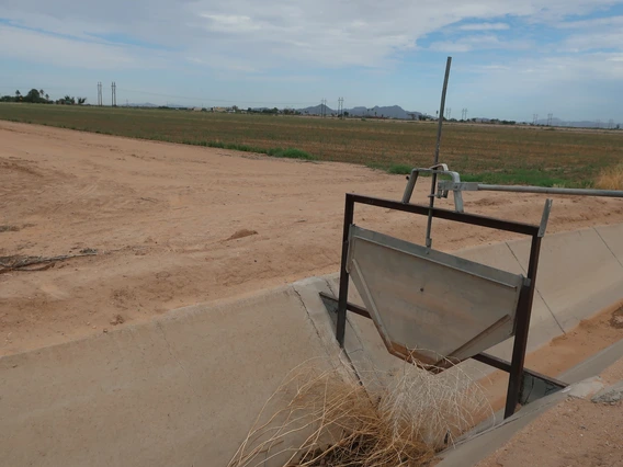 Photo of a dry irrigation ditch