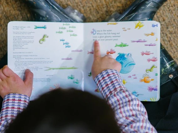 young child with book