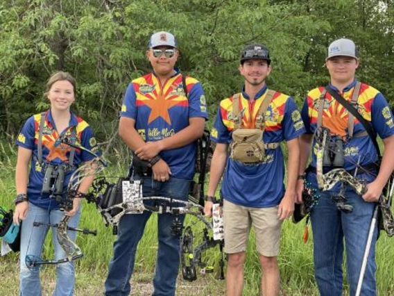 4-h member with archery equipment