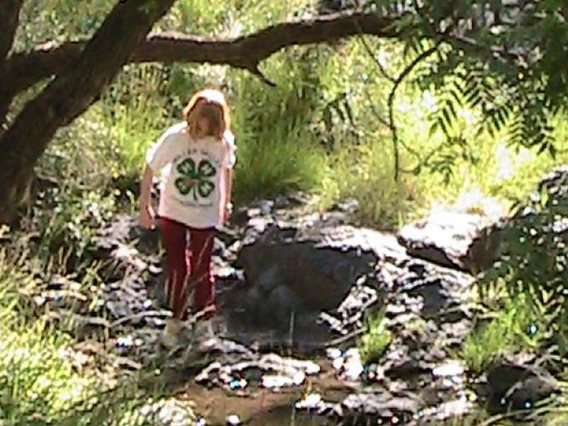 4-h youth standing in stream