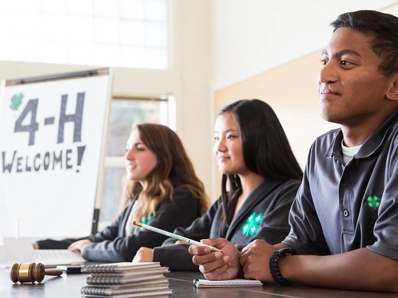 4-h members at a welcome table