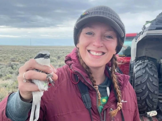courney duchardt holding bird on rangelands