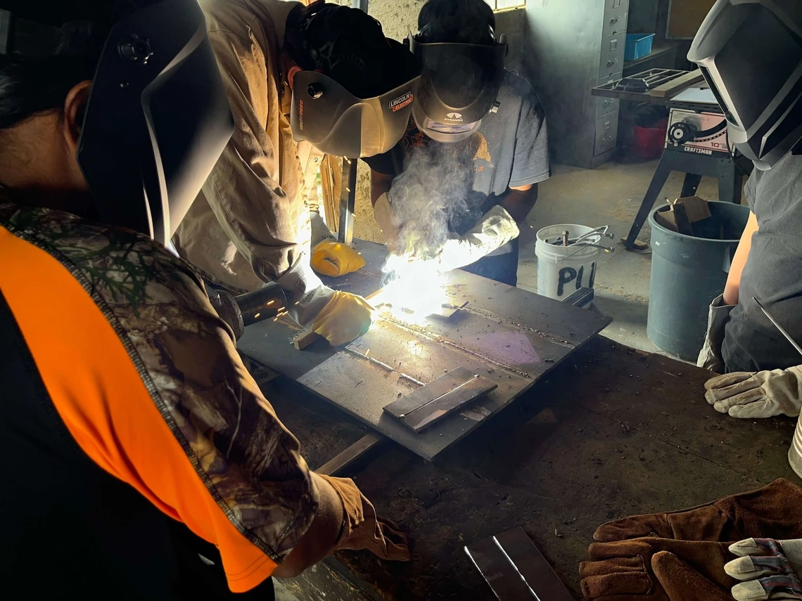 Photo of kids welding