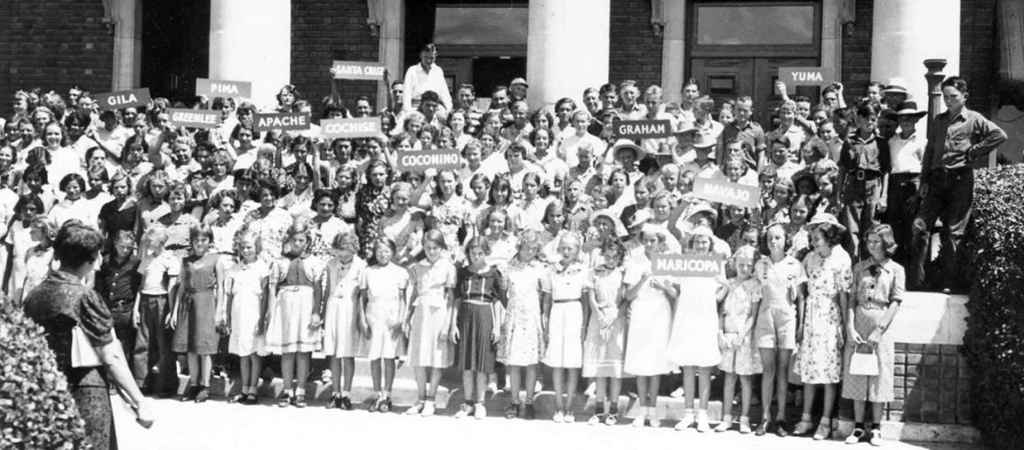 historical photo of 4-H youth on steps of Old Main