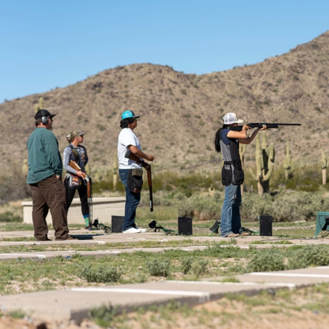 4-H youth target shooting with rifles