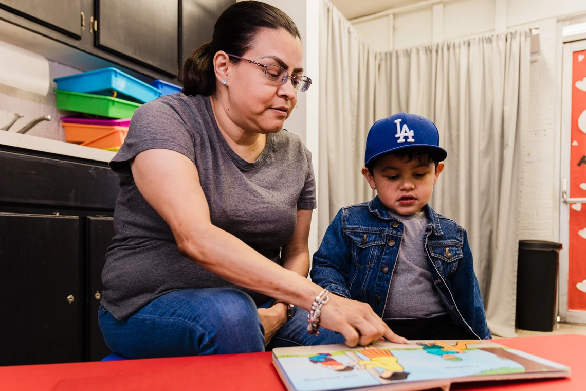 mother and son learning to read