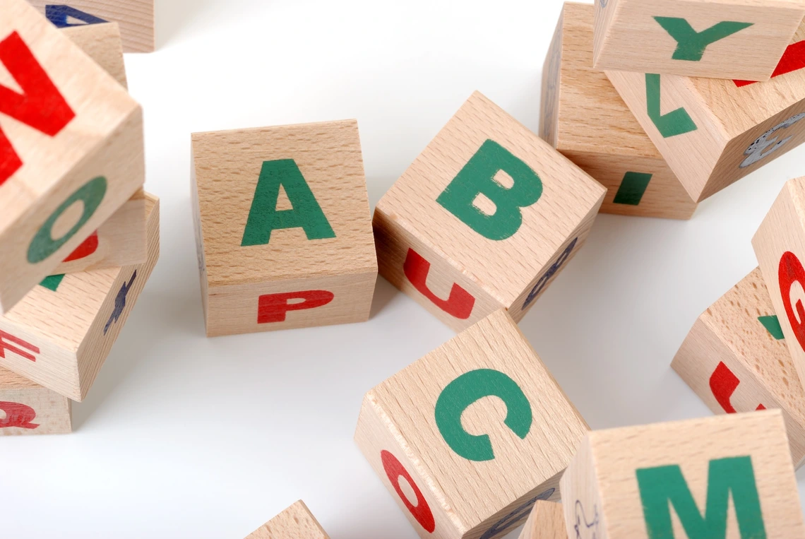 Photo of childrens toy blockm with letters on them