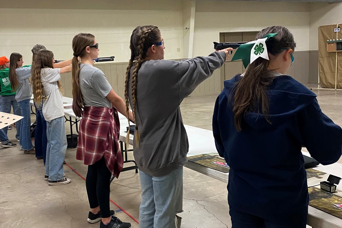 4-H youth at small shooting range