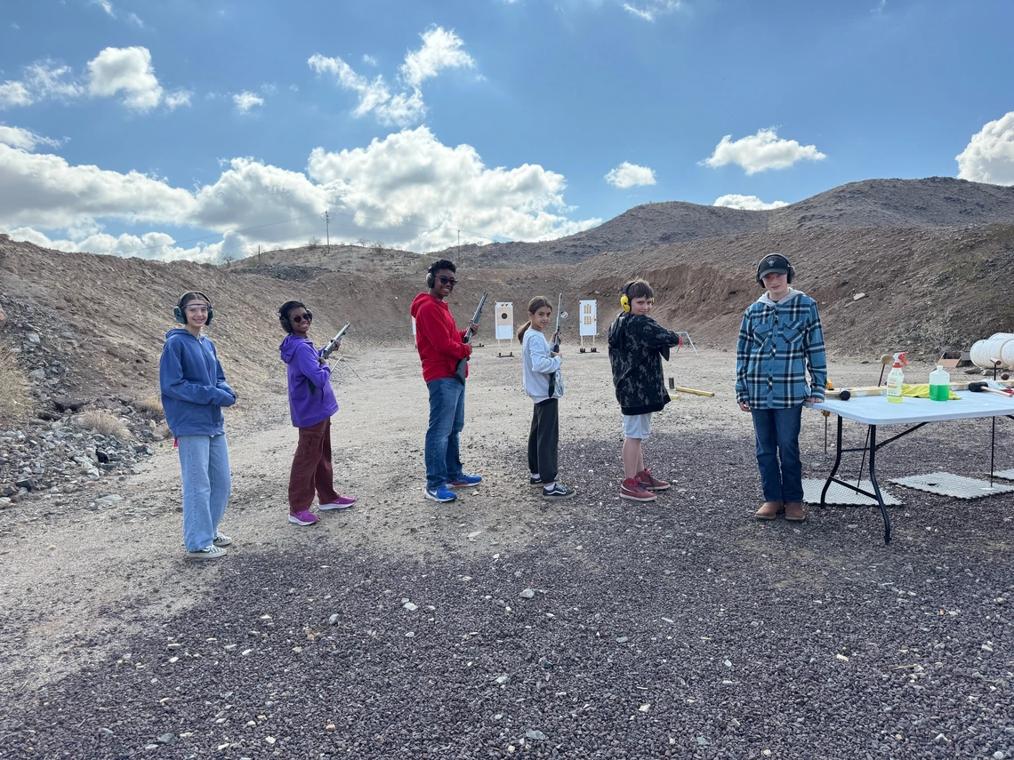 Club members lined up and waiting to shoot