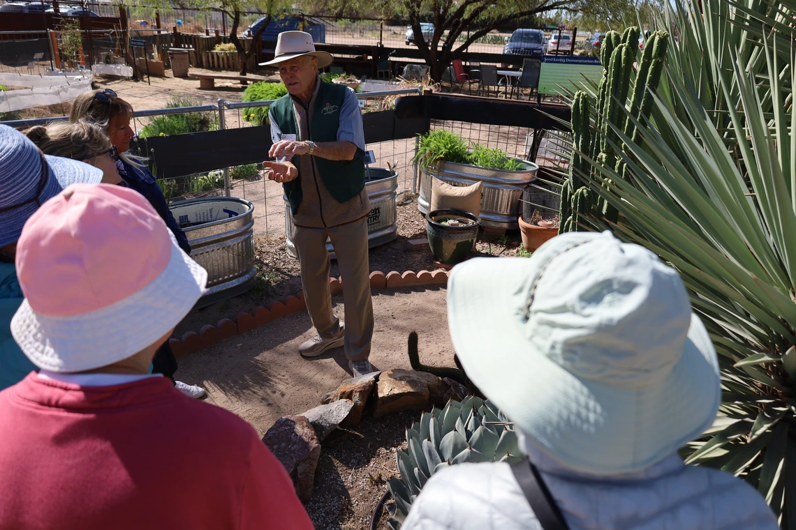 master gardener teaching in desert garden