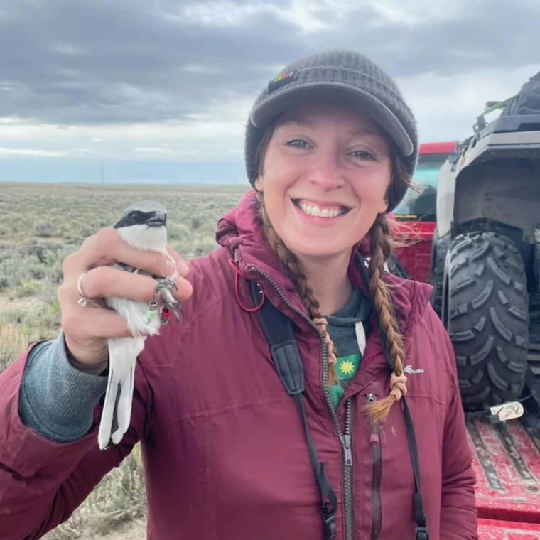 courney duchardt holding bird on rangelands