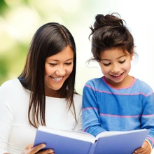 Mother and daughter reading