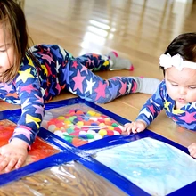 Children playing sensory 