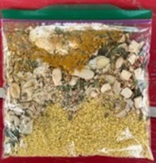 plastic sandwhich bag with 2 portions of curry couscous for backpacking