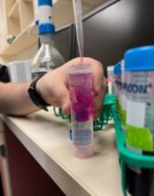 lab bend pippette inidcator into liquid