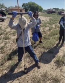 using soil auger to sample soil is field