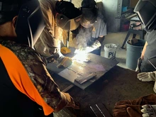 Photo of kids welding