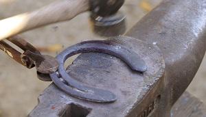 Anvil, hammer and horseshoe