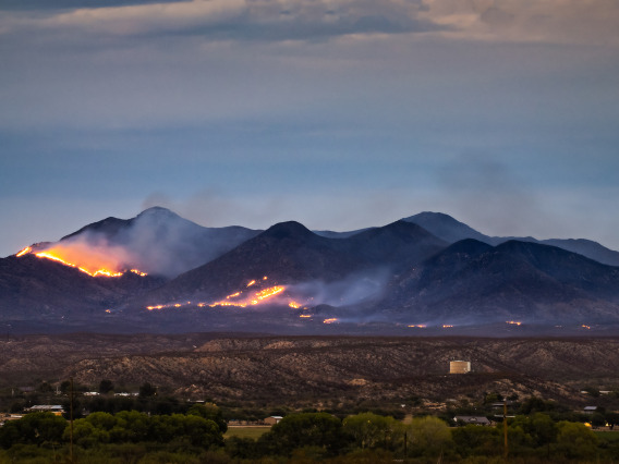 Photo of a wildfire in mountains